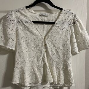 Zara Eyelet Peplum V-Neck Top in White